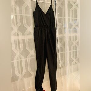 Beautiful, black jumper size small silky